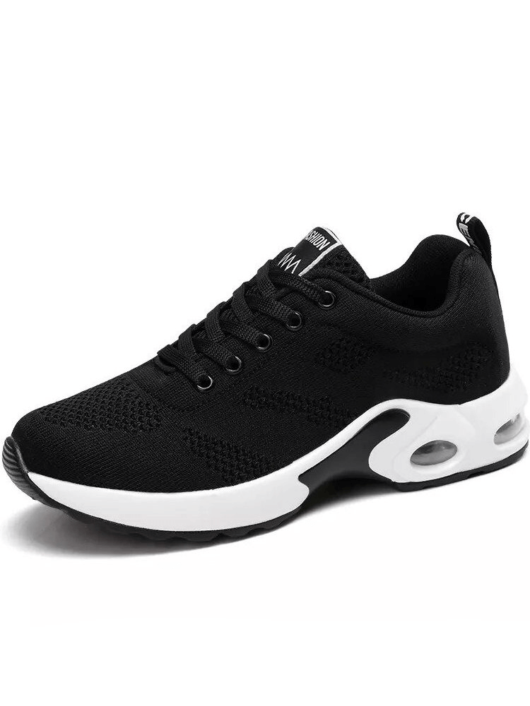 Black sports breathable women's running shoes with soft flexible mesh and cushioned sole, perfect for comfort and flexibility.
